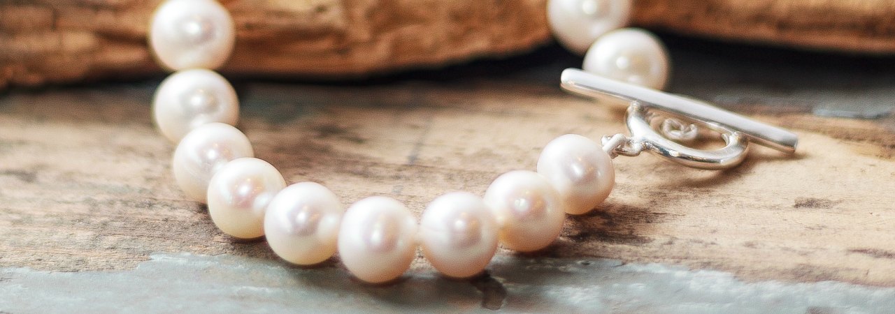 Freshwater pearls - hand knotted with silver t bar catch. - large